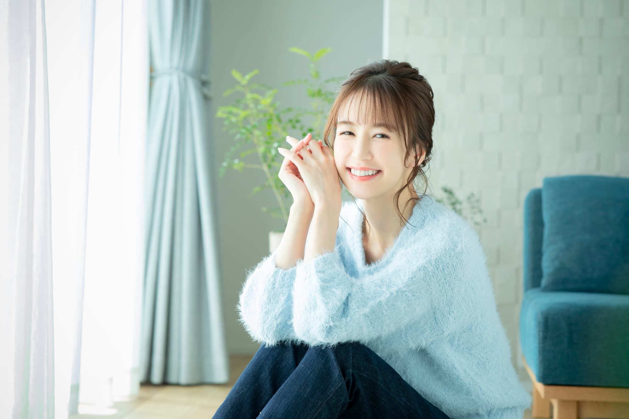 顎関節症の治療をして笑顔の女性