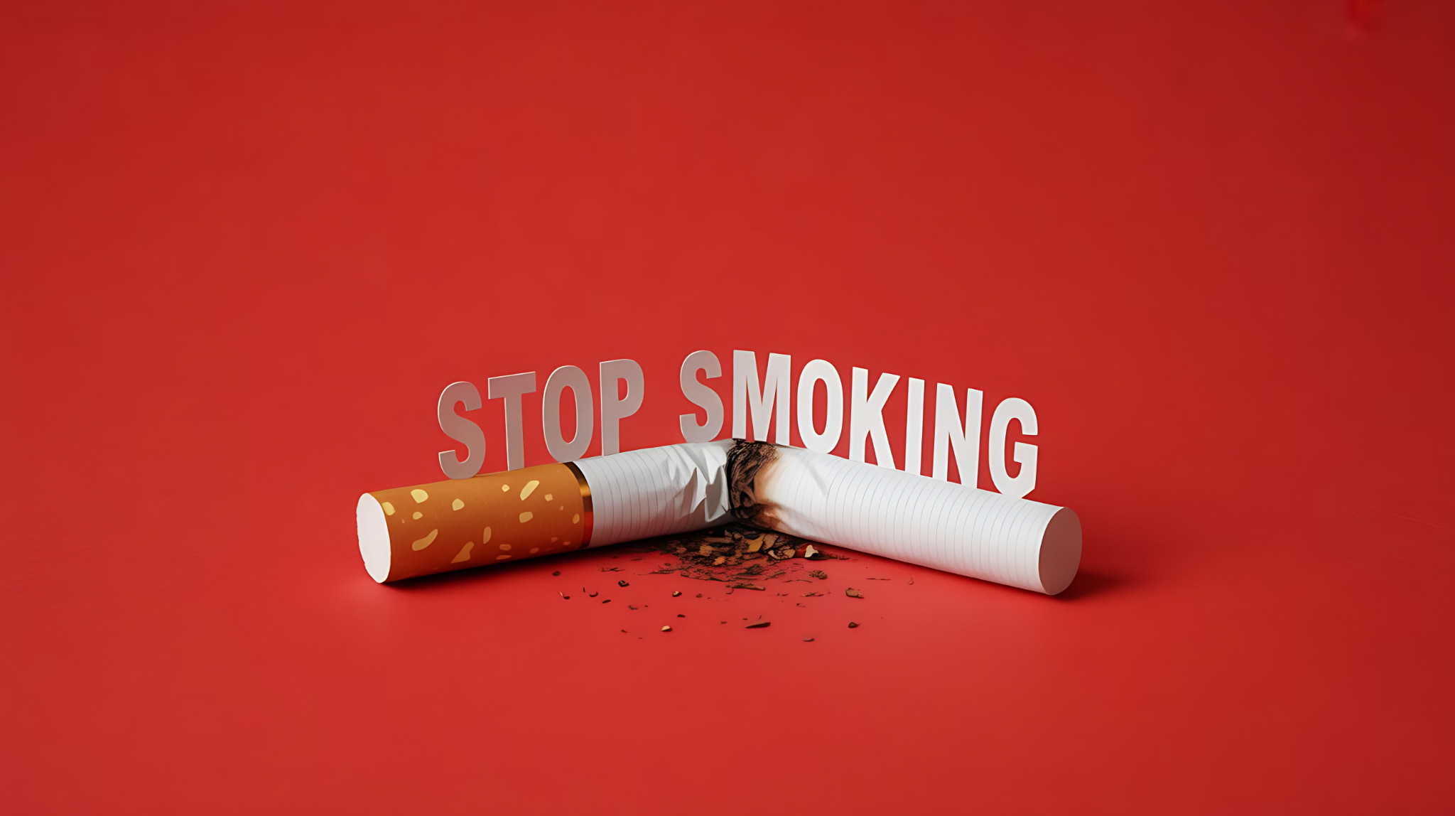 ホワイトニング後の白い歯をキープするために禁煙をすすめる折ったタバコとストップスモーキングの文字