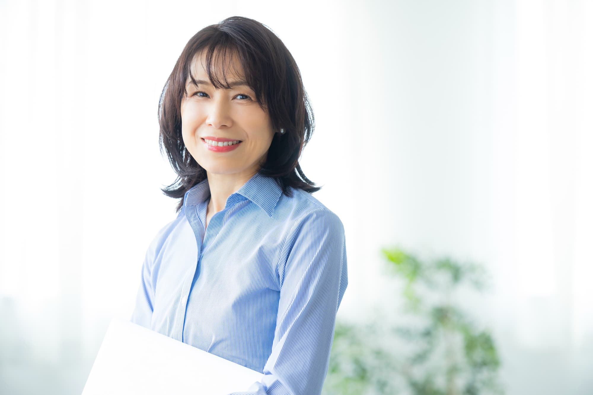 歯周病を治療した笑顔の女性